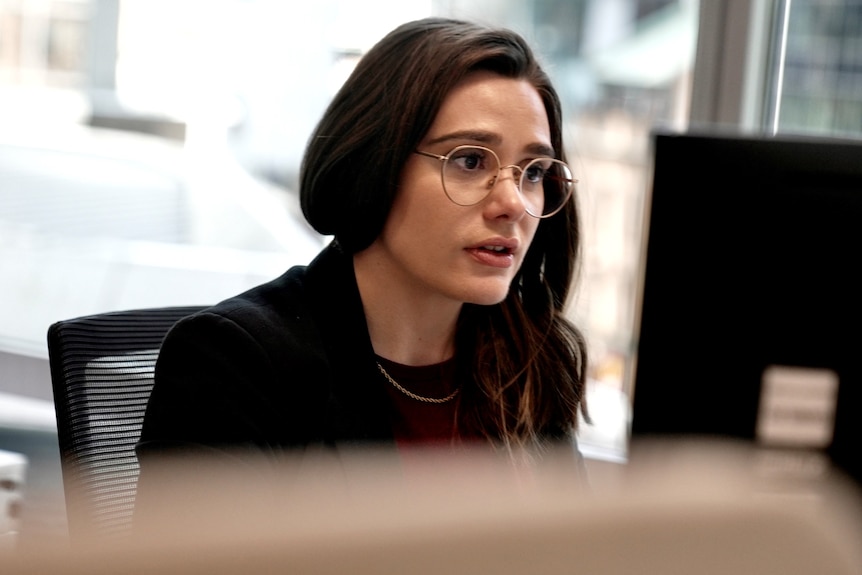 CoreLogic's head of Australian research Eliza Owen at her office desk.