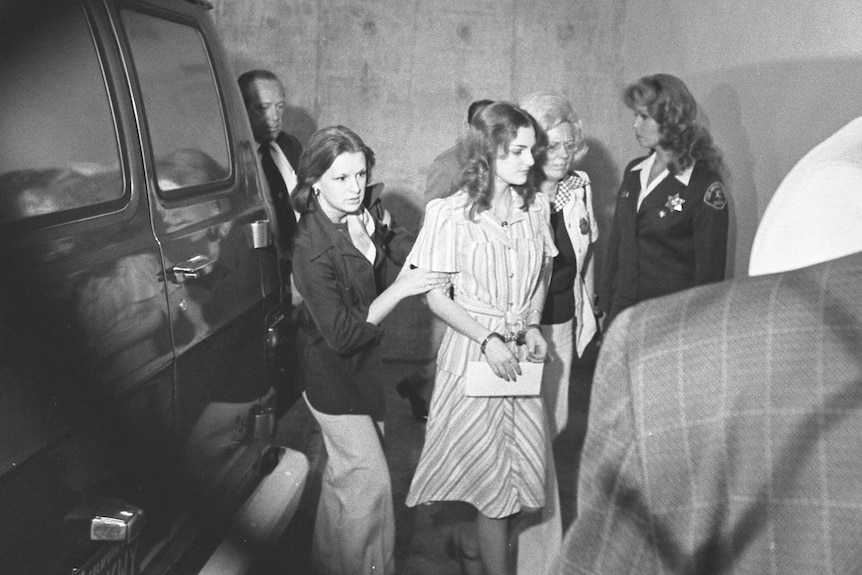 A young woman in handcuffs 