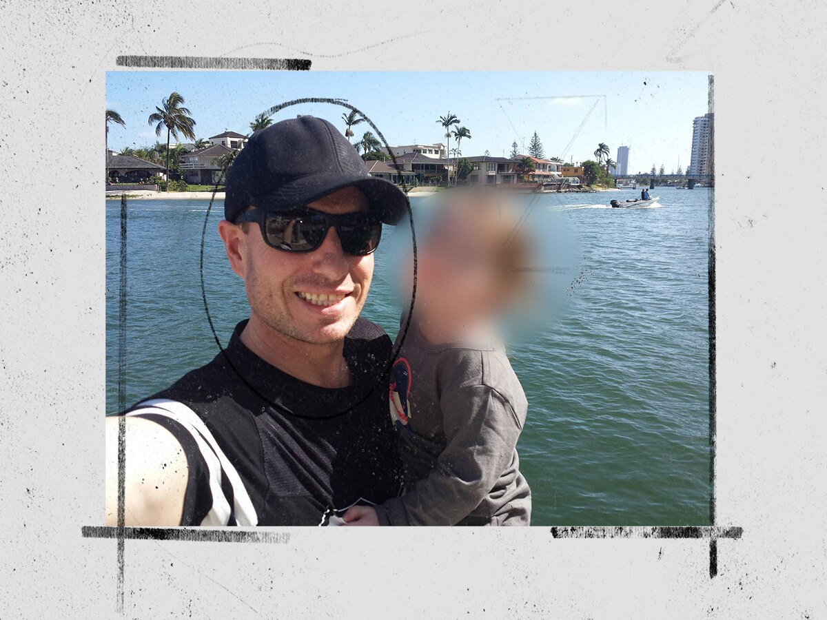 A man in front of the water with a blurred out picture of a little girl.