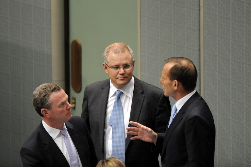 Christopher Pyne, Scott Morrison and Tony Abbott discuss strategy in Parliament House