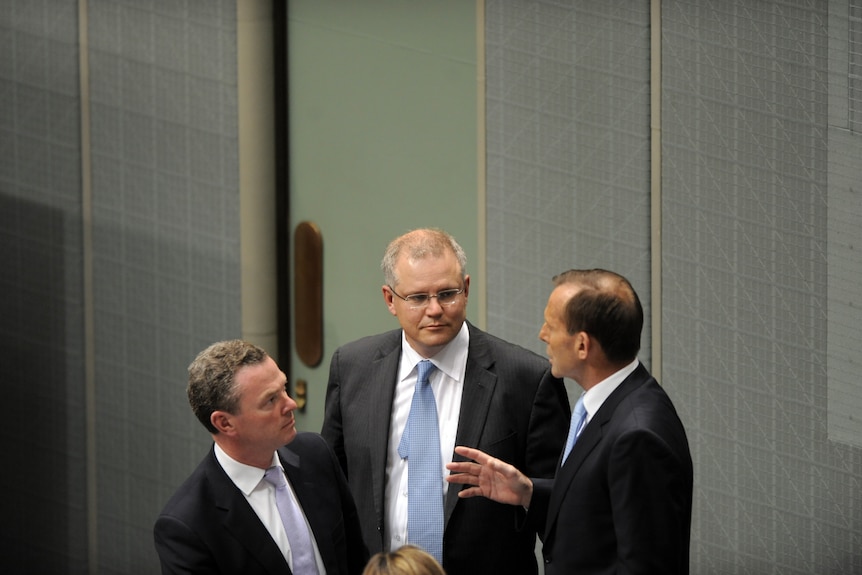 Christopher Pyne, Scott Morrison and Tony Abbott discuss strategy in Parliament House