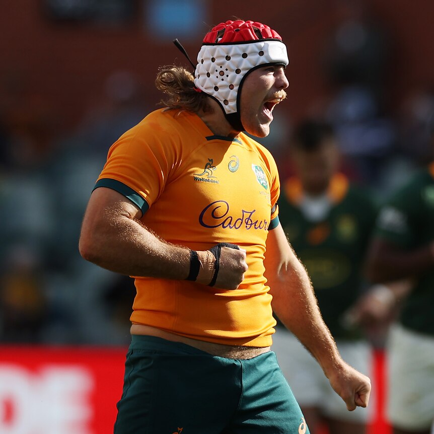 A Wallabies player celebrates scoring a try against the Springboks.