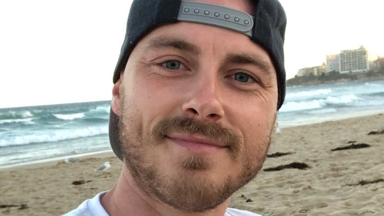 Chris Csabs selfie on a beach.