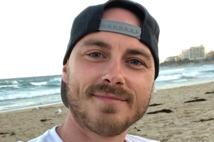 Chris Csabs selfie on a beach.
