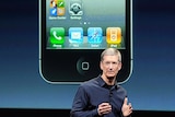 Apple CEO Tim Cook introduces the new iPhone 4s in California on October 4, 2011.