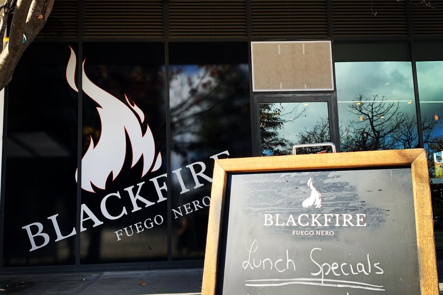 The outside of the Black Fire restaurant in Braddon with a specials board out the front.