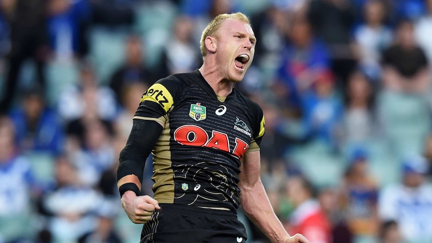 Peter Wallace celebrates a try against Canterbury