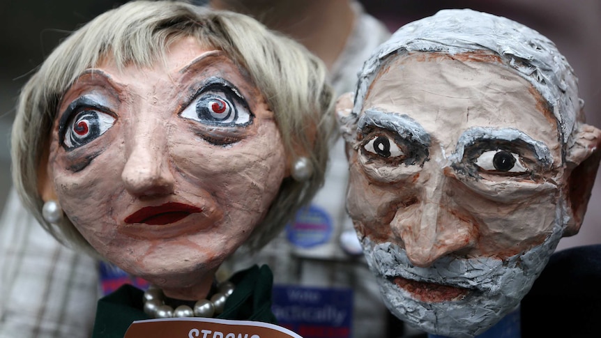 Puppets of Conservative Party leader Theresa May and Labour Party leader Jeremy Corbyn.