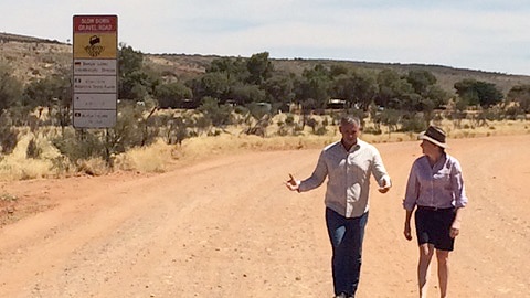 NT Chief Minister Adam Giles walks with Tourism Central Australia deputy chair Dale McIver