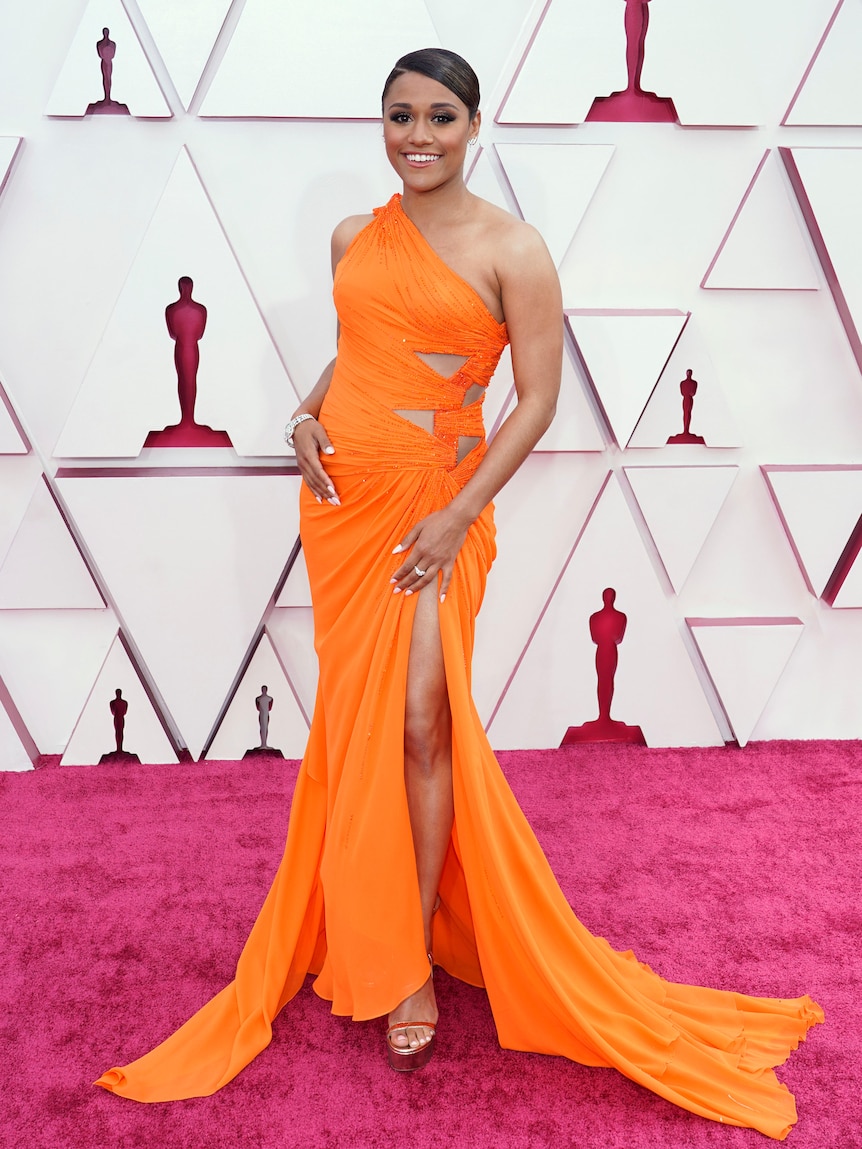 Ariana DeBose in bright orange gown