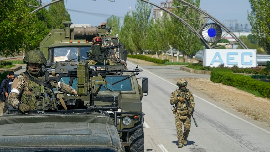 A Russian military convoy is seen on the road toward the Zaporizhzhia Nuclear Power Station.
