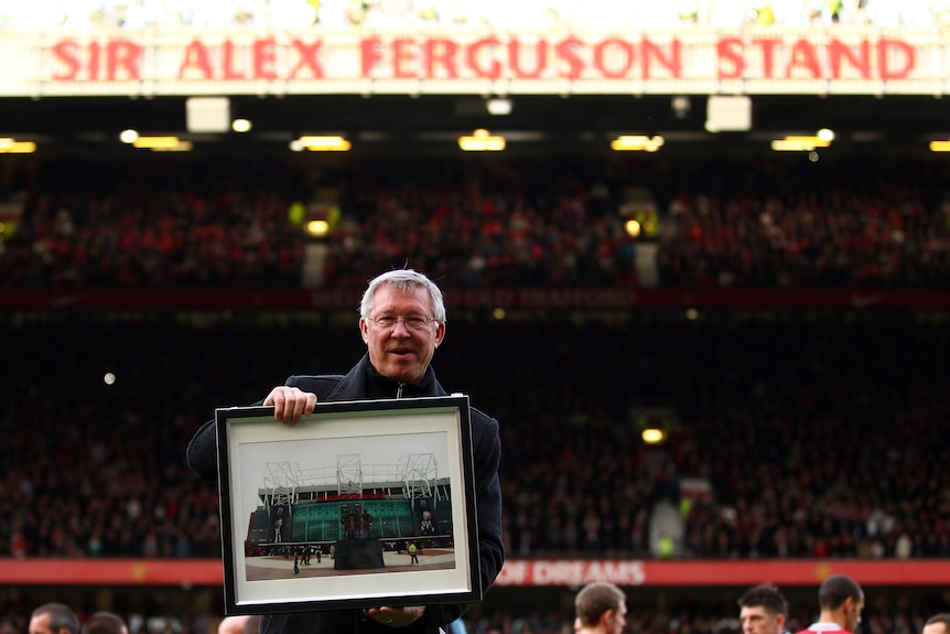 Sir Alex Ferguson was honoured for his 25 years in charge of Manchester United with the renaming of Old Trafford's North Stand.