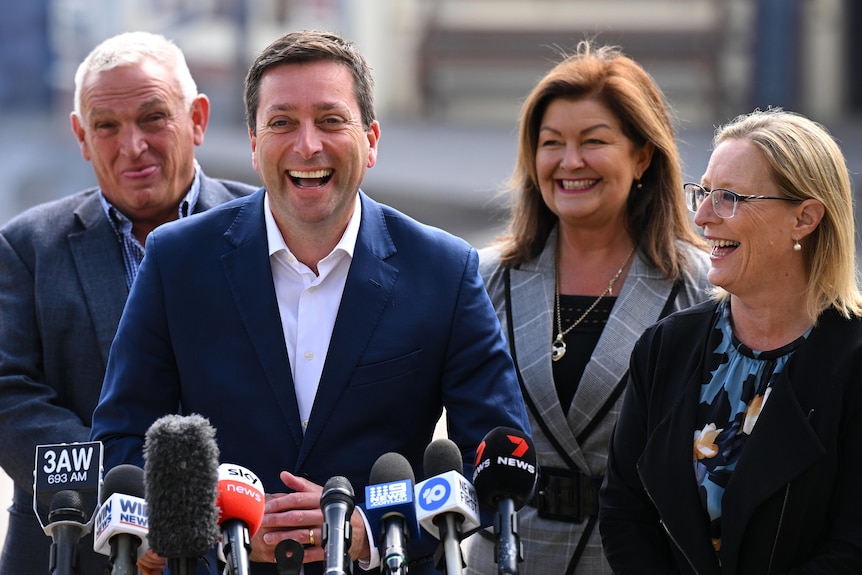 Matthew Guy laughs, surrounded by supporters in Sovereign Hill.