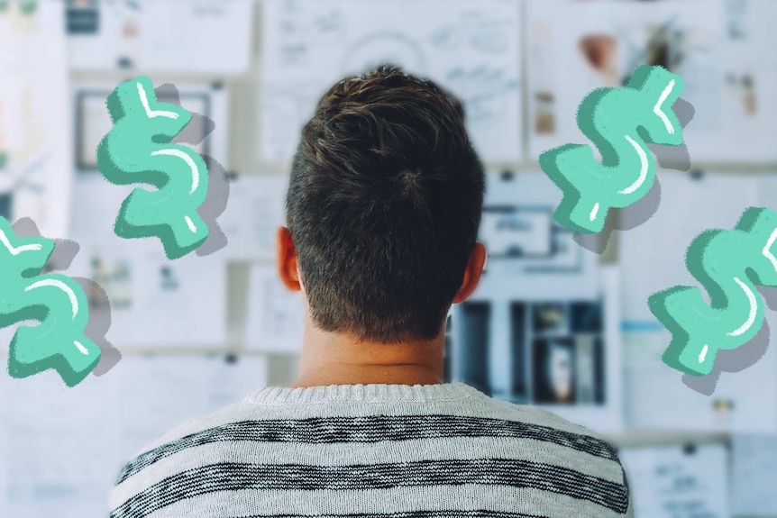 Back of a man's head as he looks at a wall covered in notes for a story about donating to charity and tax deductions.