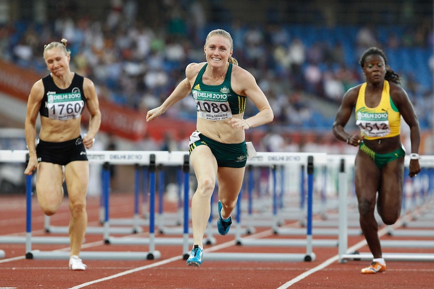 Sally Pearson crosses the finish line at the 2010 Commonwealth Games