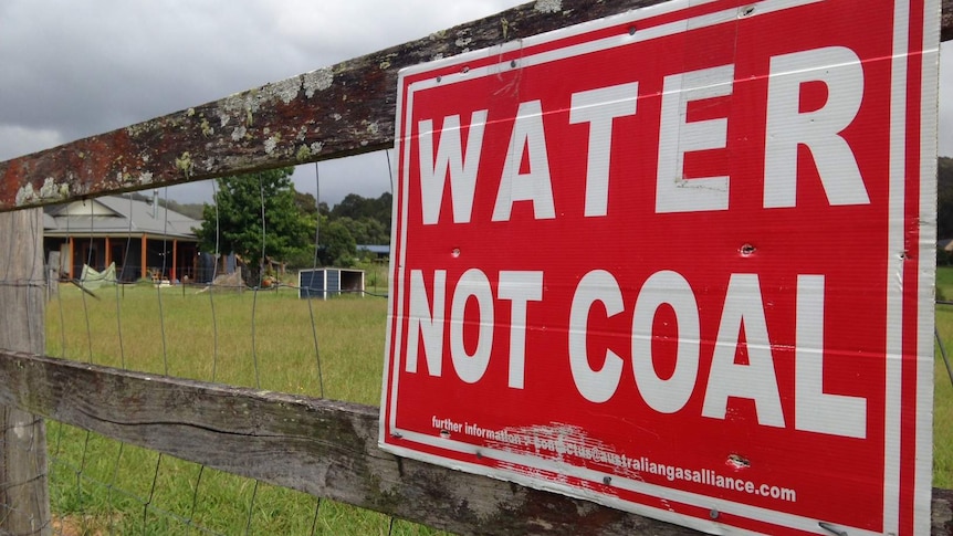 A sign which reveals how strongly Wyong locals feel about plans for a mine in their area