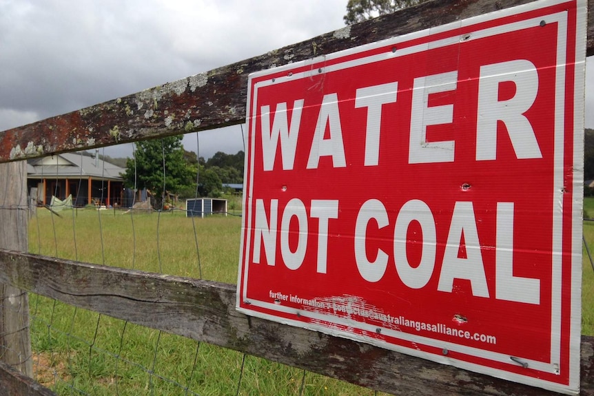 A sign which reveals how strongly Wyong locals feel about plans for a mine in their area