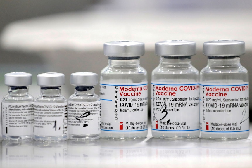 Vials of coronavirus disease (COVID-19) vaccines of Pfizer-BioNTech and Moderna.