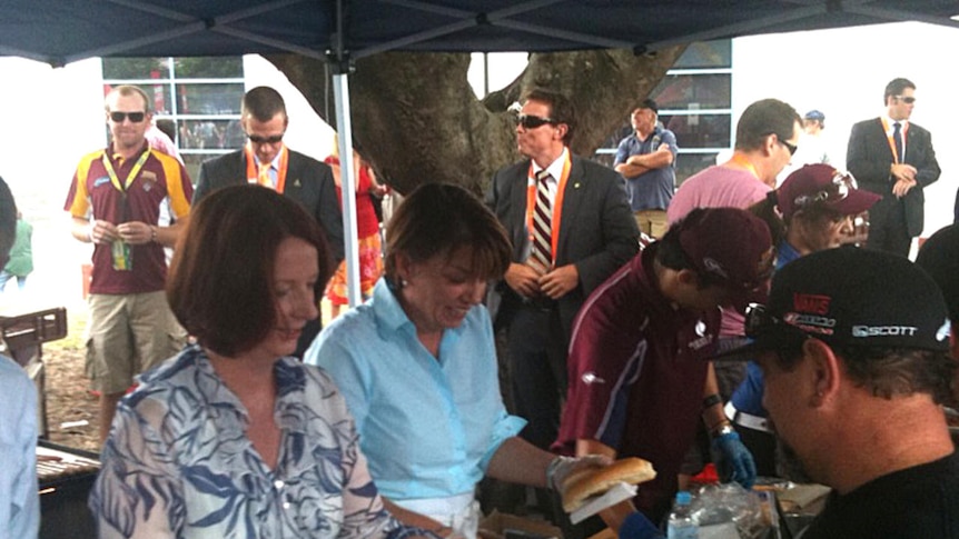 Julia Gillard and Anna Bligh serve up sausages