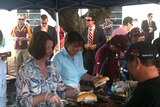 Julia Gillard and Anna Bligh serve up sausages