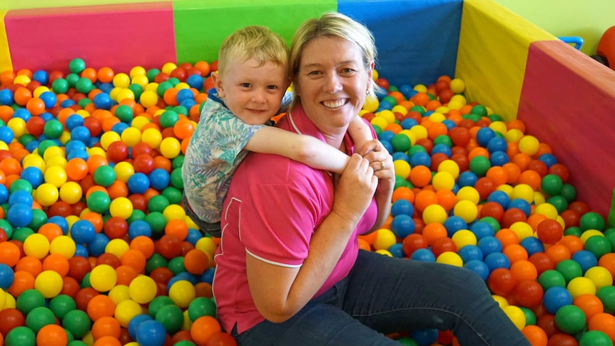 Pauline Rumley with four year old son Bobby in a ball pit