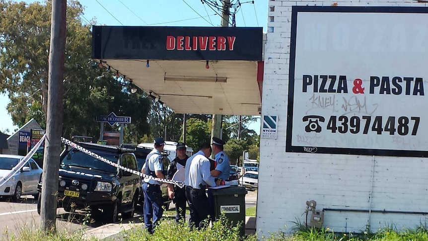 Police at the Toukley crime scene