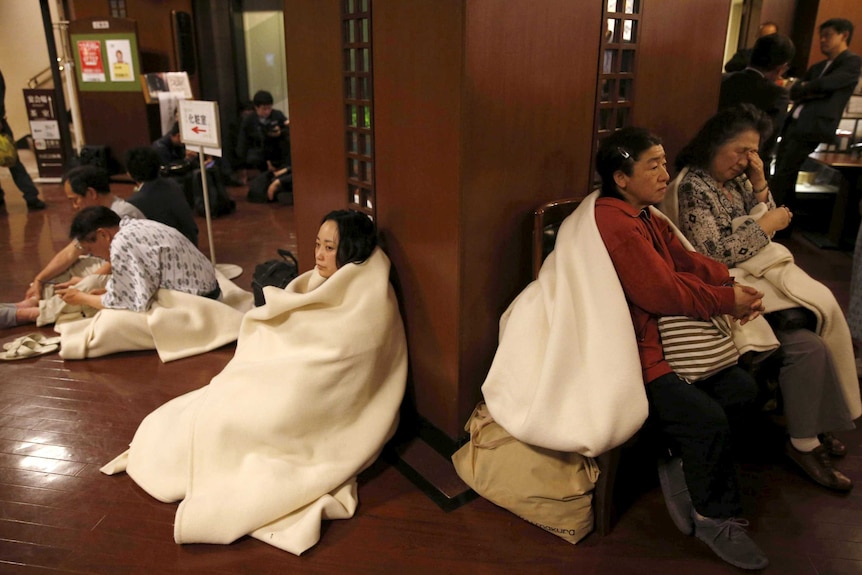 Hotel guests gather after another earthquake in Kumamoto, southern Japan