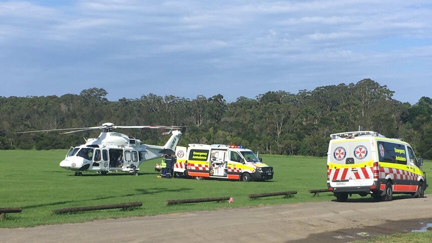 Ambulance and helicopter move patient