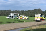 Ambulance and helicopter move patient