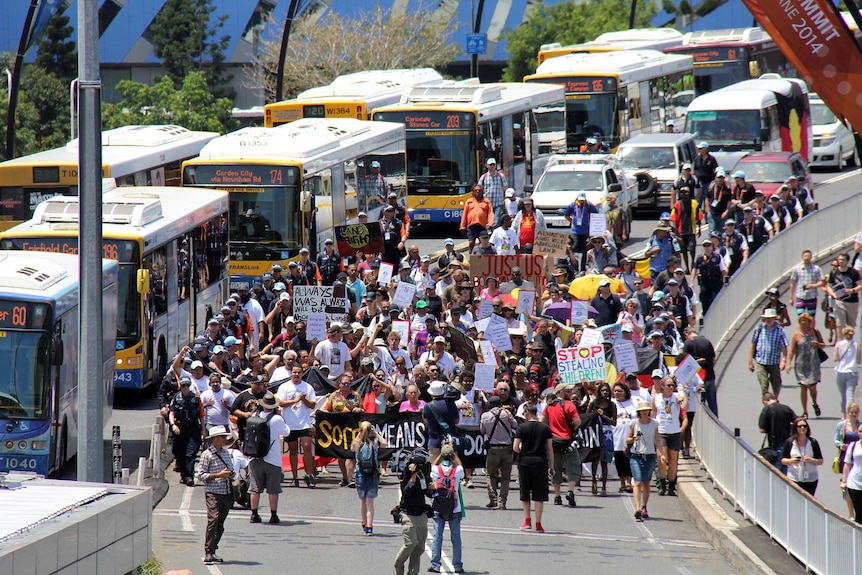 Aboriginal protesters march from Brisbane city to Musgrave Park in South Brisbane.