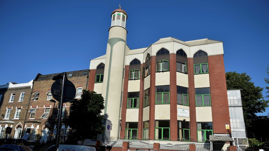 A general view of the Finsbury Park mosque— the brick structure is three levels with a spire and green framed windows