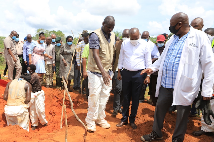 Kenya Interior minister Kithure Kindiki inspects graves where victims of a Christian Cult are buried.