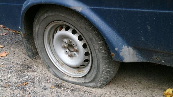 Dozens of cars damaged by potholes on the New England Highway.