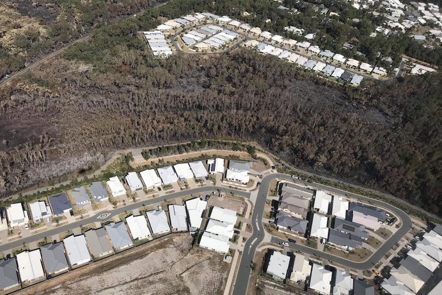 The bushfire at Peregian Springs came close to damaging dozens of homes.