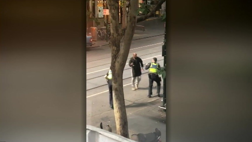 Police taser knife-wielding man in Bourke Street