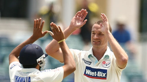 Leading by example... Stand-in NSW skipper Stuart Clark boasted figures of 2 for 31.