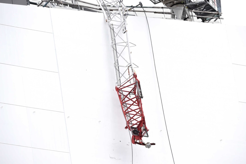 A crane collapse in North Sydney left three men trapped.