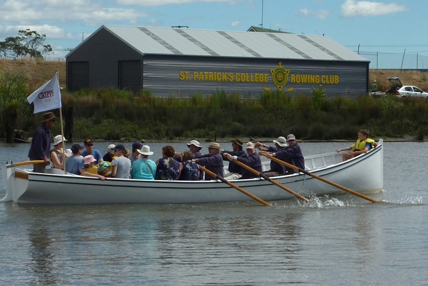 Admiral rows past St Patrick's College Rowing Club