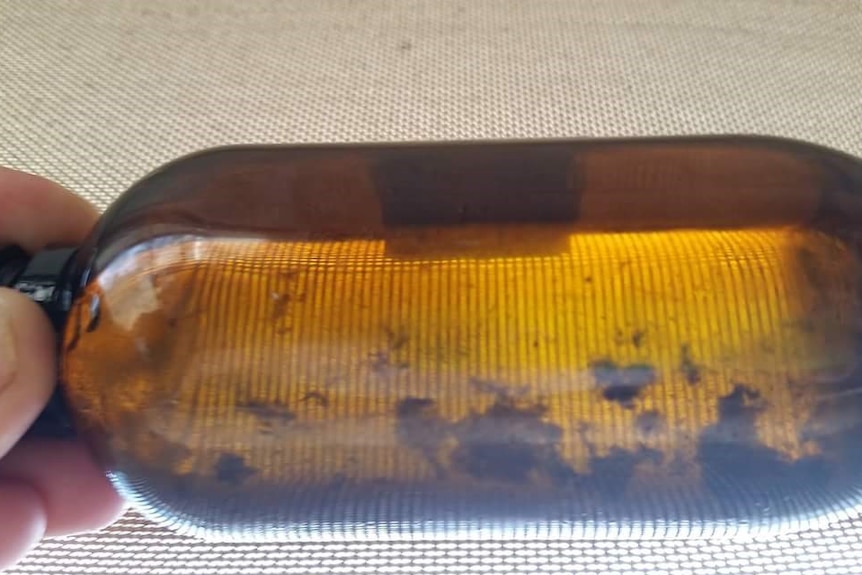 A batch of medicinal cannabis oil in a bottle.