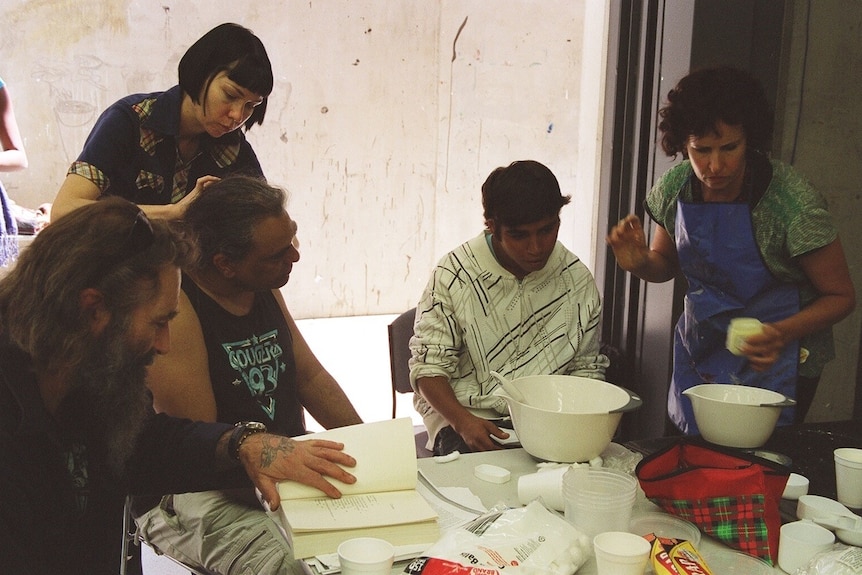 The artists Yhonnie Scarce and Judy Watson casting people's ears in dental alginate to make an artwork