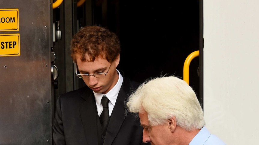 Daniel Kelsall is led from a Corrective Services prison van as he arrivrs at the NSW Supreme Court in Sydney, March 5, 2015.