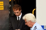 Daniel Kelsall is led from a Corrective Services prison van as he arrivrs at the NSW Supreme Court in Sydney, March 5, 2015.