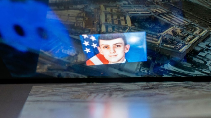 An illustration of the Discord logo and the suspect, national guardsman Jack Teixeira, reflected in an image of the Pentagon