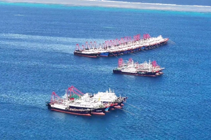 An aerial shot of Chinese ships linked together.