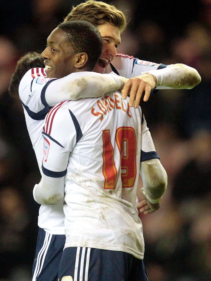 LtoR Marvin Sordell and Marcos Alonso celebrate after goal.