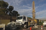 Protesters disrupt road link test drilling