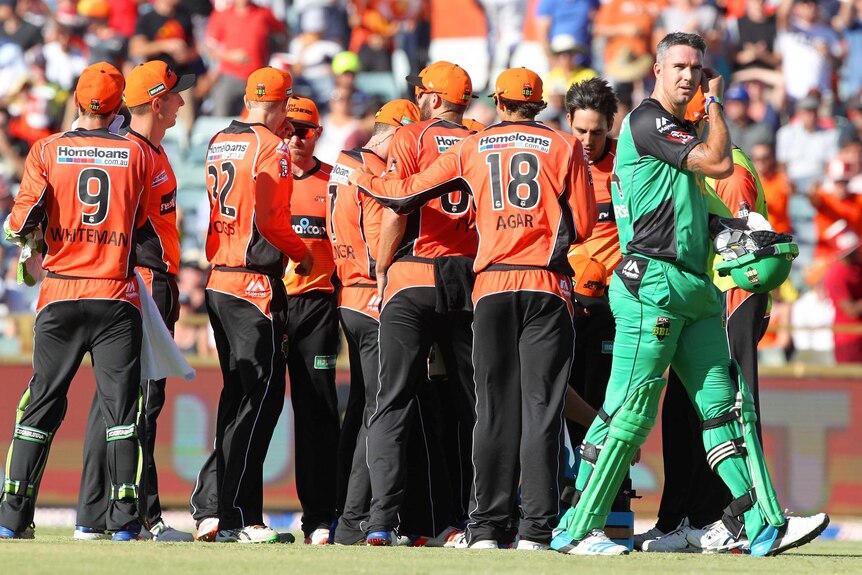 Kevin Pietersen walks away after being dismissed by Mitchell Johnson