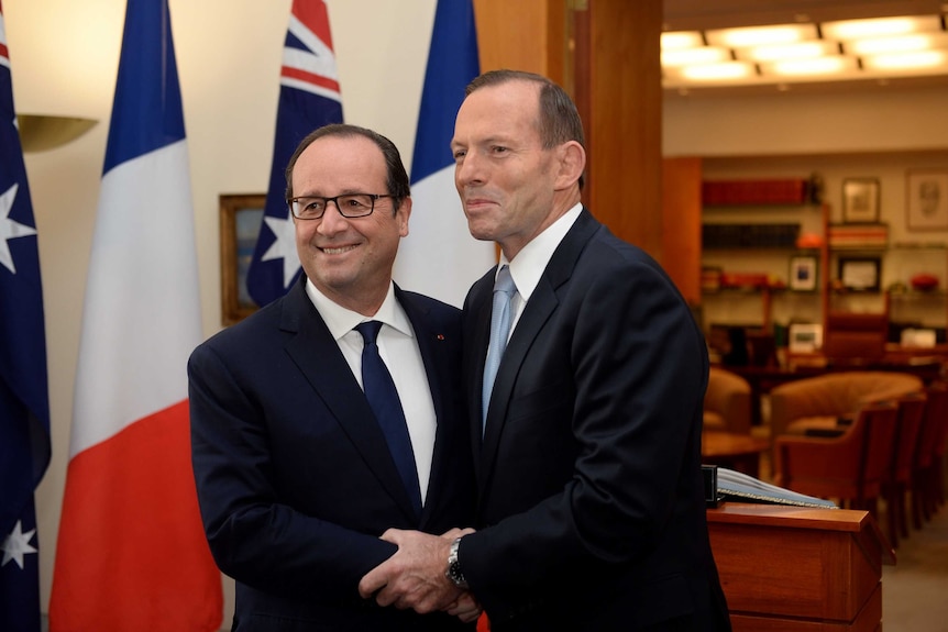 French president Francois Hollande meets Prime Minister Tony Abbott at Parliament House in Canberra.