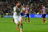Real Madrid's Sergio Ramos celebrates a goal in stoppage time against Atletico Madrid.