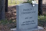 Frank Underwood's gravestone, which reads "Francis J Underwood. 1959-2017. 46th President of the United States of America".